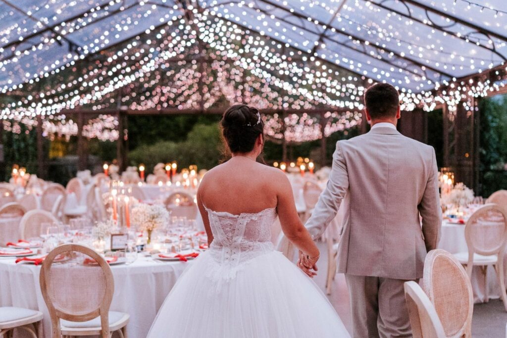 Newlyweds kissing at an elegant wedding venue on Lake Maggiore